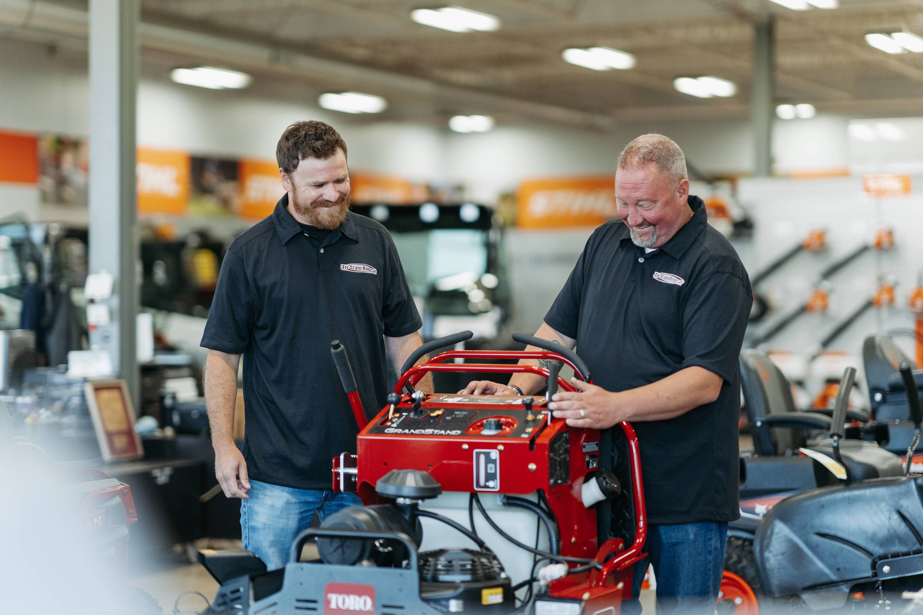 Employee talking about toro grandstand