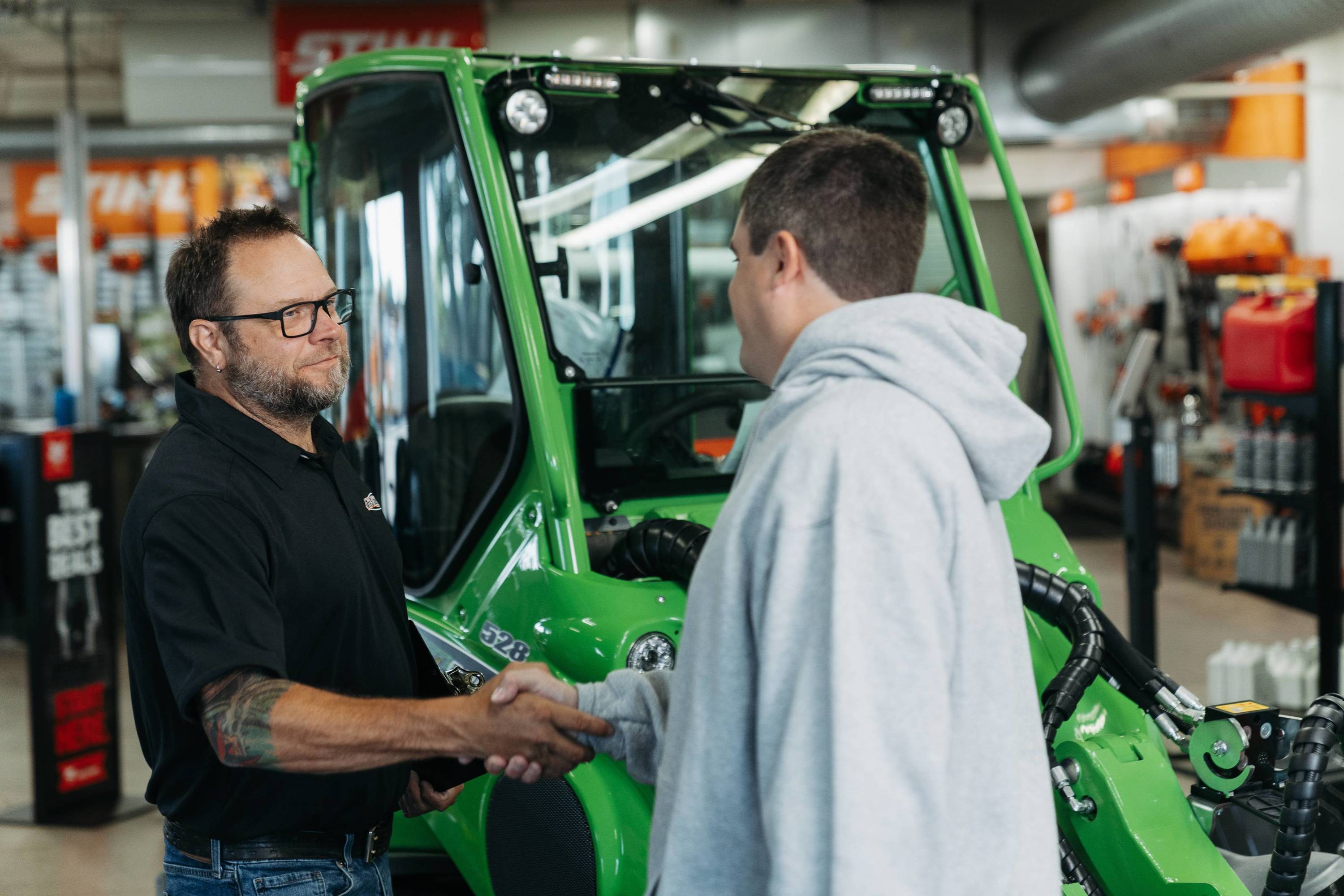 Customers meeting a Tri-State Bobcat Employee